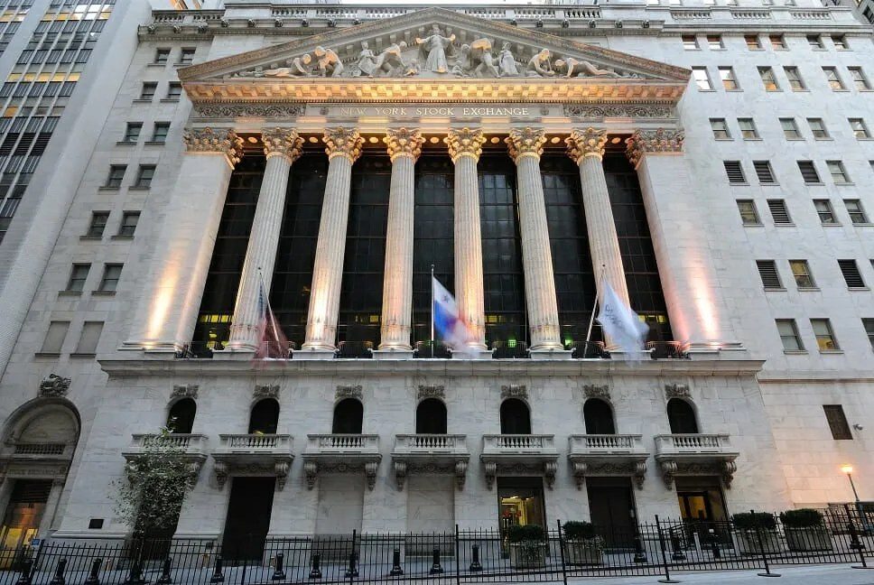 The columned front of the New York Stock Exchange with the SIFLC seal above the entrance